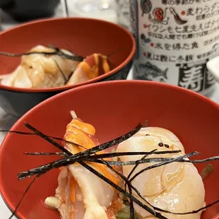 two bowls of food on a table