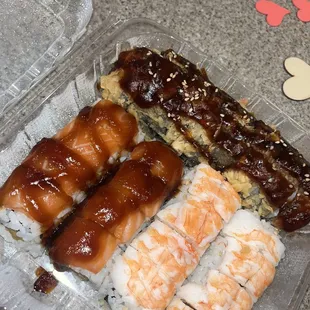 a variety of sushi and rolls