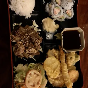 Bento box beef teriyaki California roll tempura