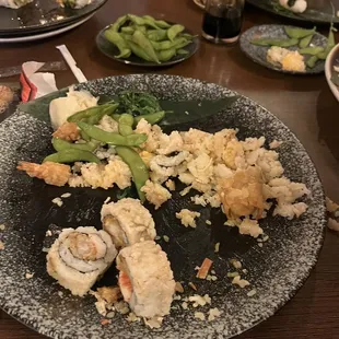 Me trying to take the rice off the rolls because it's just way too dense and hiding it under all those edamame..  ‍