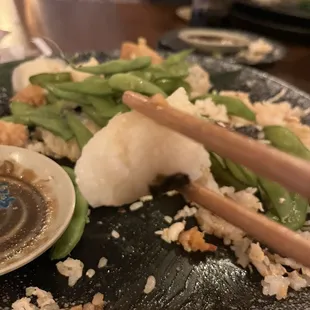 A ball of very densely packed rice for the sashimi.