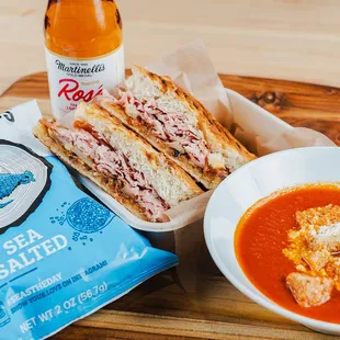 a bowl of soup and a sandwich