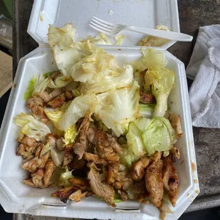 a take out container of food