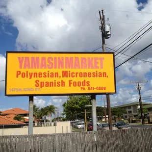 a sign for a mexican market