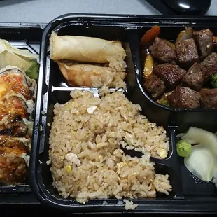 Teriyaki Steak bento main plate and Full Superman Roll take out.