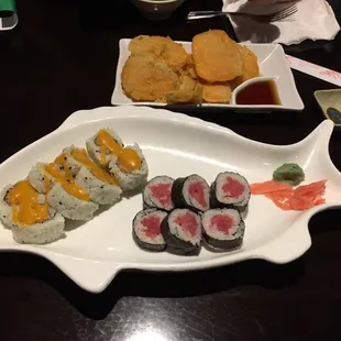 Spicy salmon and tuna sushi. Fried sweet potatoes appetizer.