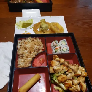 a bento box with a variety of food items