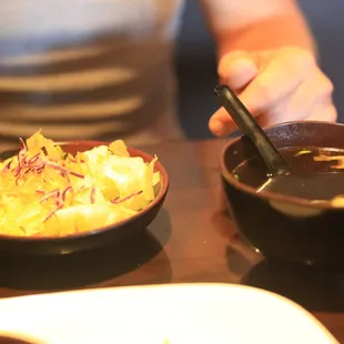 a person eating a bowl of food