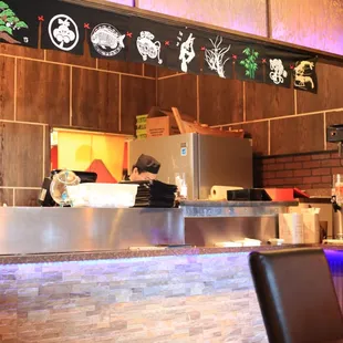 a view of a restaurant counter