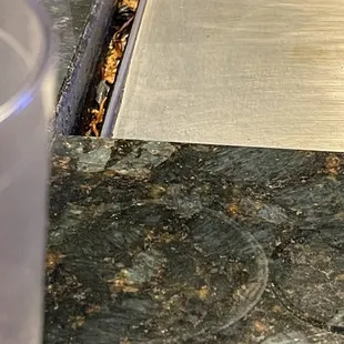 a close up of a knife cutting a piece of meat