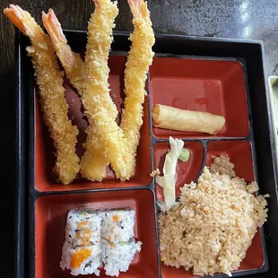 Shirk Tempura Bento box with fried rice and egg roll.