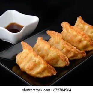 Fried pork dumplings (Gyoza )