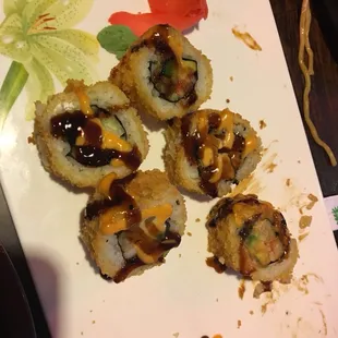 Some sort of fried sushi