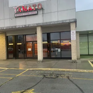 Storefront from parking lot.