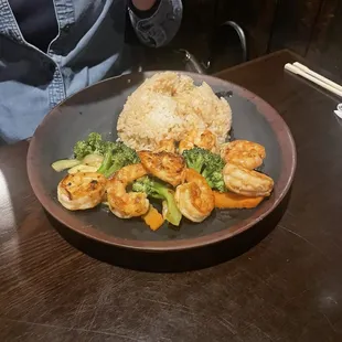 Gluten free shrimp with fried rice and vegetables.