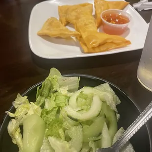 Crab Rangoon and salad.