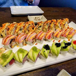 a large platter of sushi