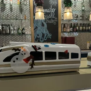 Sushi delivery train