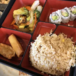 a plate of rice and vegetables