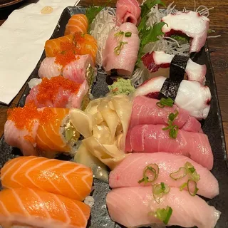 F. 8 Nigiri, 8 Sashimi and 3 Kingdom Rolls