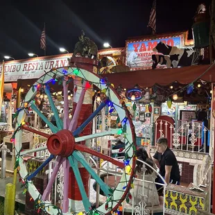 a ferris wheel in the middle of the street