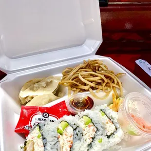 Sushi Lunch Plate special with Rock n' Roll, hibachi noodles and gyoza.