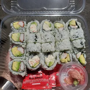 Two sushi combo: Snowcrab Roll, Shrimp and Avocado Roll, with California Roll and Hibachi Noodles (not pictured) as sides