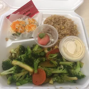 Vegetable hibachi with stir fry rice and California roll.