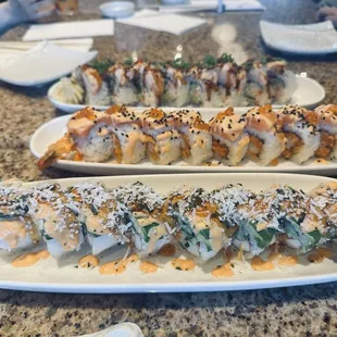Happy valley roll , spicy baked salmon roll,