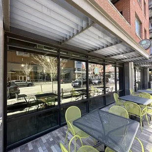 Outdoor seating area next to the sidewalk