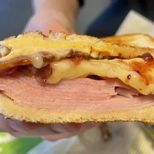 Thick layers of turkey inside the "Summit" with melting cheese!