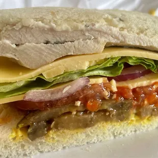 Create Your Own (sourdough bread, romaine lettuce, tomato, red onion, chicken breast, roasted eggplant, garlic mayo and dijon mustard)