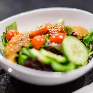 a salad in a bowl on a table