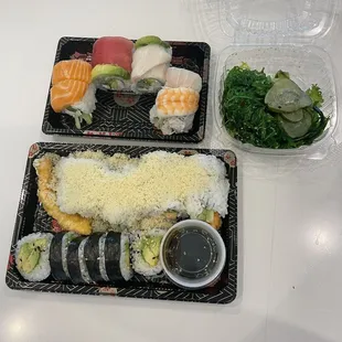 Rainbow roll, seaweed salad, salmon tempura, avocado roll