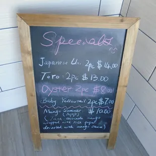 Daily specials board in the front foyer.