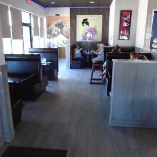 View looking in from the front entryway, left dining area.