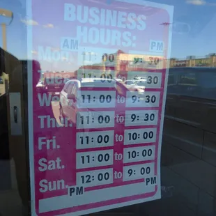 Hours of operation, front entry door.