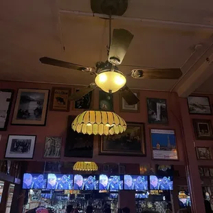 a ceiling fan and a bar