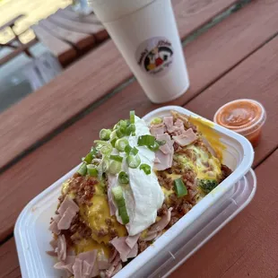 Chicken loaded potato and passion fruit juice