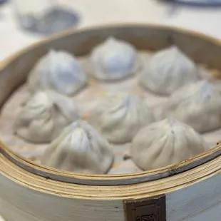Pork soup dumplings. Always have to get an order for the table when your here