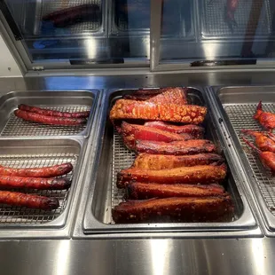 Sausage, pork belly and stuffed wing