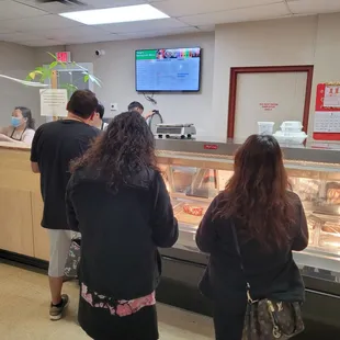 Standing in line.