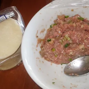 I bought ground pork to make wontons - added chopped green onions, bamboo shoots and mushrooms.