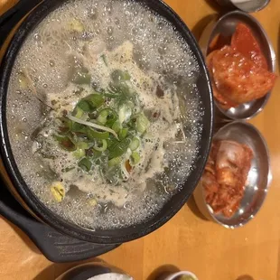 Beef tendon haejang guk (soup) with kimchi side dishes