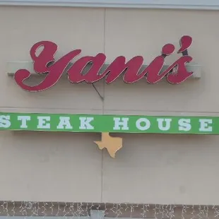 the sign of Yani&apos;s Steakhouse