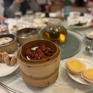 Chicken feet, egg tarts, sesame balls