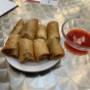 4 egg rolls per order swimming in oil after sitting a while in cold restaurant