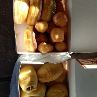 Assorted kolaches, glazed and donut holes.