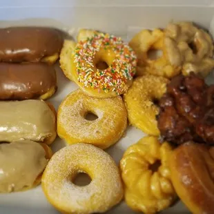 Chocolate/Maple bars, sugar, frosted w/sprinkles, old fashioned, buttermilk, curlers, apple fritters, cinnamon rolls.