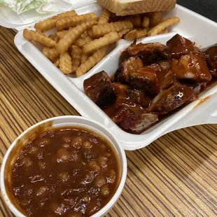 Rib Tip platter. Has baked beans and fries for a side.